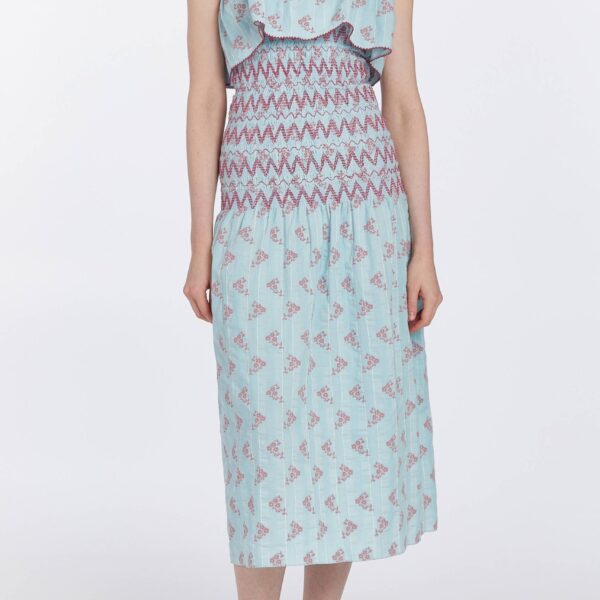 Markarian dresses with romantic neckline and structured silhouette