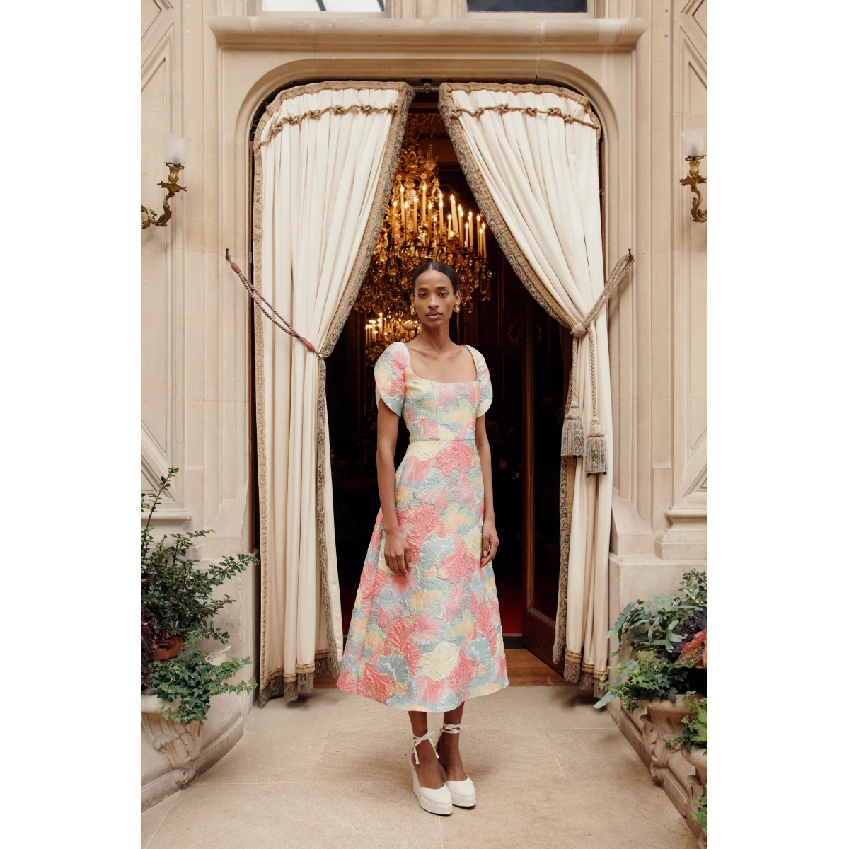 Markarian dress with romantic neckline and structured silhouette