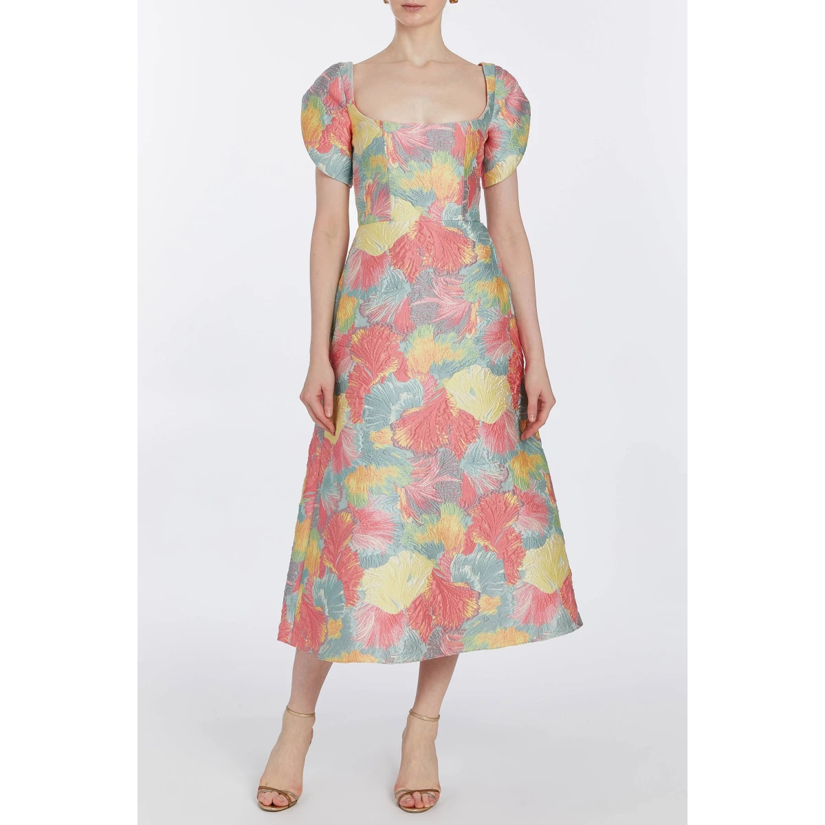 Markarian dresses with romantic neckline and structured silhouette