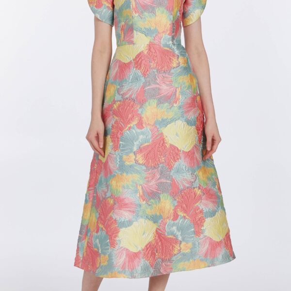 Markarian dresses with romantic neckline and structured silhouette