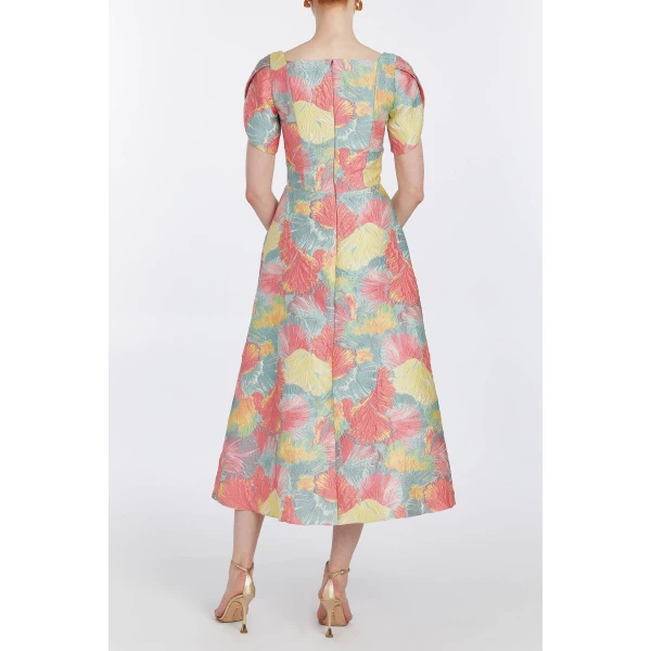 Markarian gowns with romantic neckline and structured silhouette