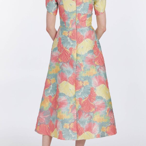 Markarian gowns with romantic neckline and structured silhouette