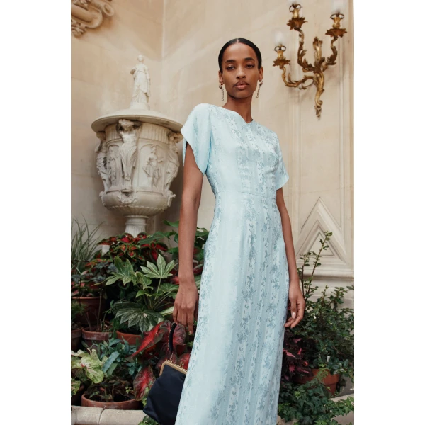 Markarian dress with romantic neckline and structured silhouette