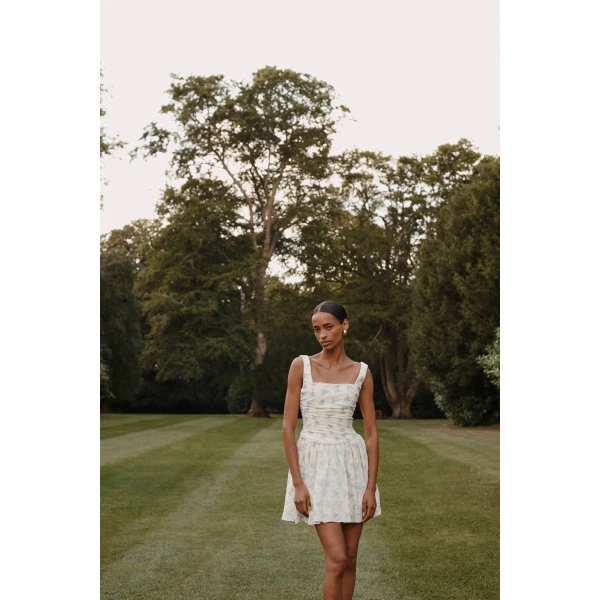 Markarian dress with romantic neckline and structured silhouette