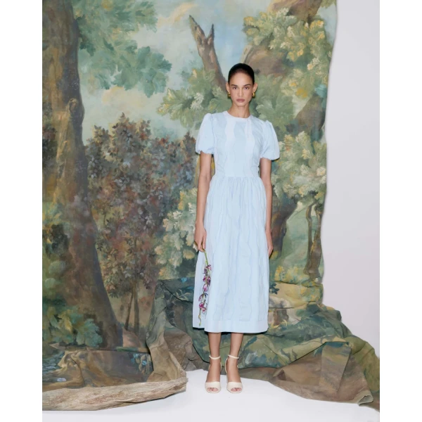 Markarian dress with romantic neckline and structured silhouette