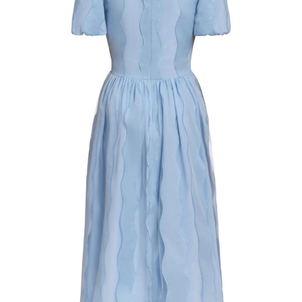 Markarian dresses with romantic neckline and structured silhouette
