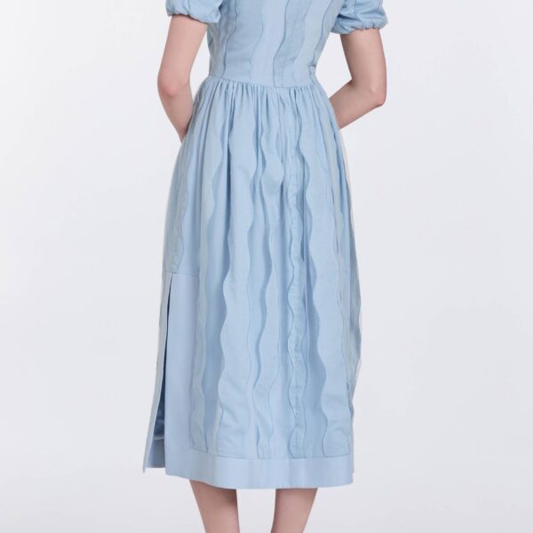 Markarian gowns with romantic neckline and structured silhouette