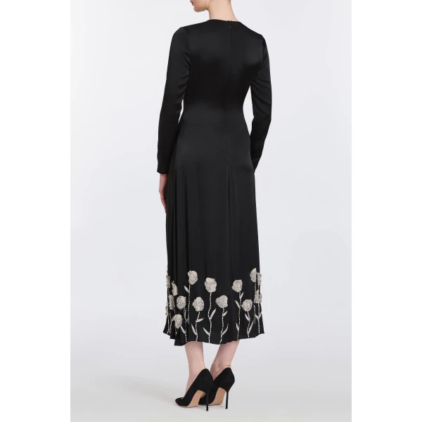 Markarian gowns with romantic neckline and structured silhouette