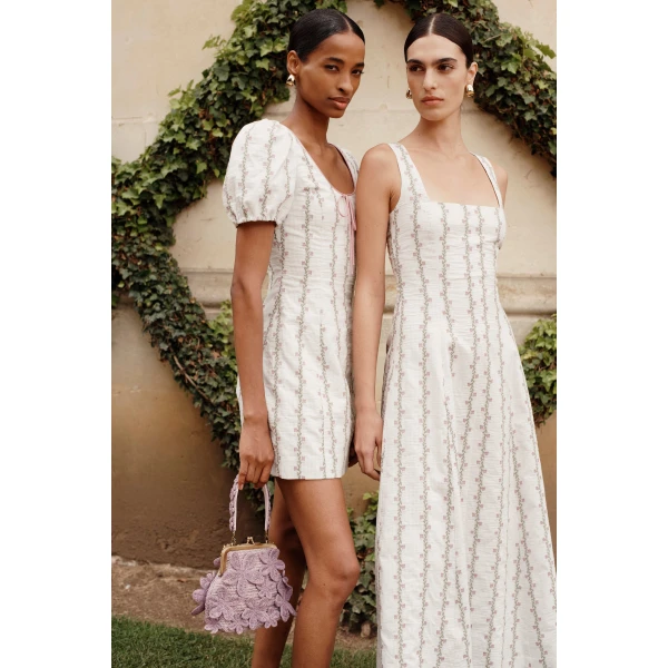 Markarian dress with romantic neckline and structured silhouette