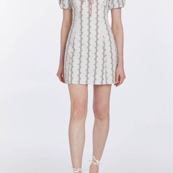 Markarian gowns with romantic neckline and structured silhouette