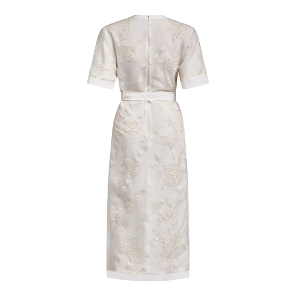 Markarian dresses with romantic neckline and structured silhouette
