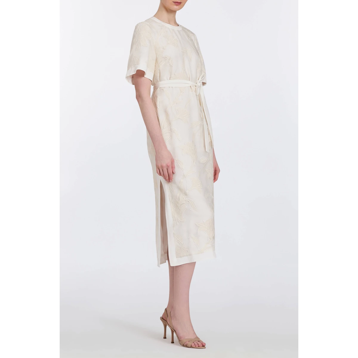 Markarian gowns with romantic neckline and structured silhouette