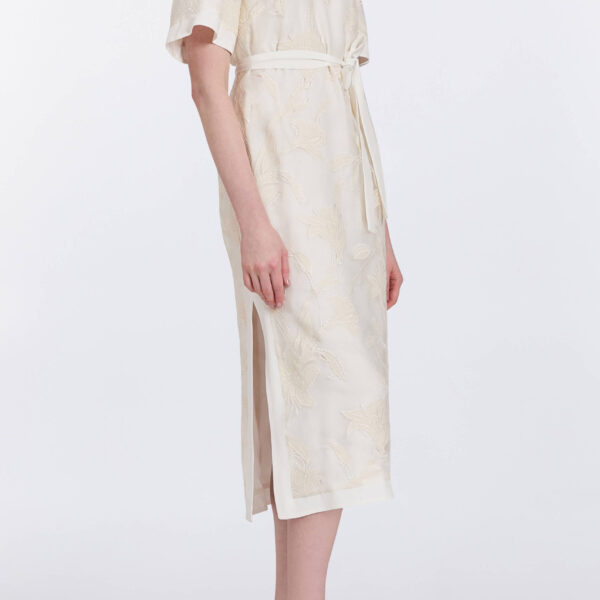 Markarian gowns with romantic neckline and structured silhouette