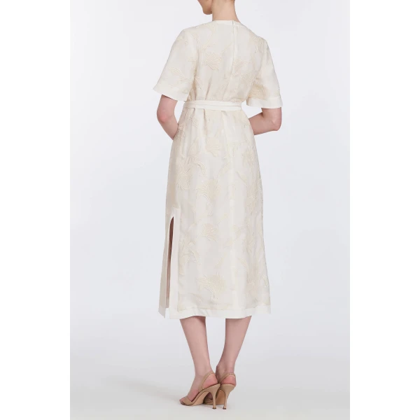Markarian gowns with romantic neckline and structured silhouette
