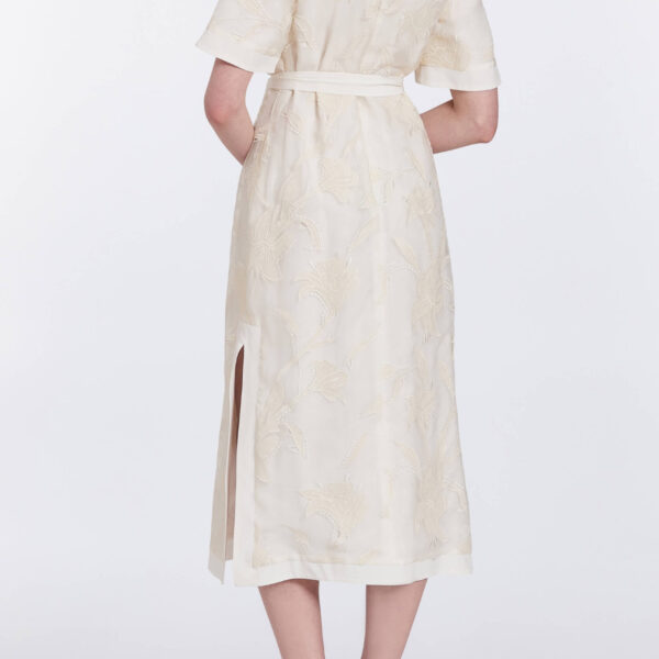 Markarian gowns with romantic neckline and structured silhouette