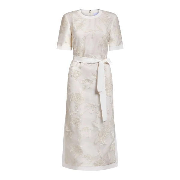 Markarian gown with romantic neckline and structured silhouette