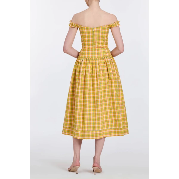 Markarian gowns with romantic neckline and structured silhouette