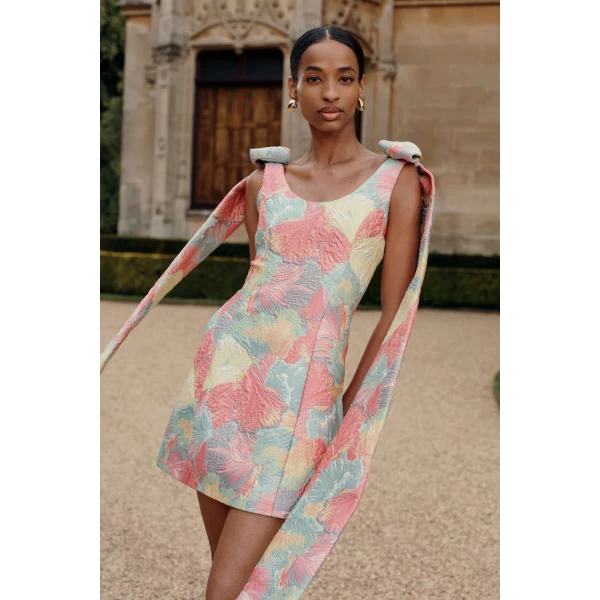 Markarian dress with romantic neckline and structured silhouette