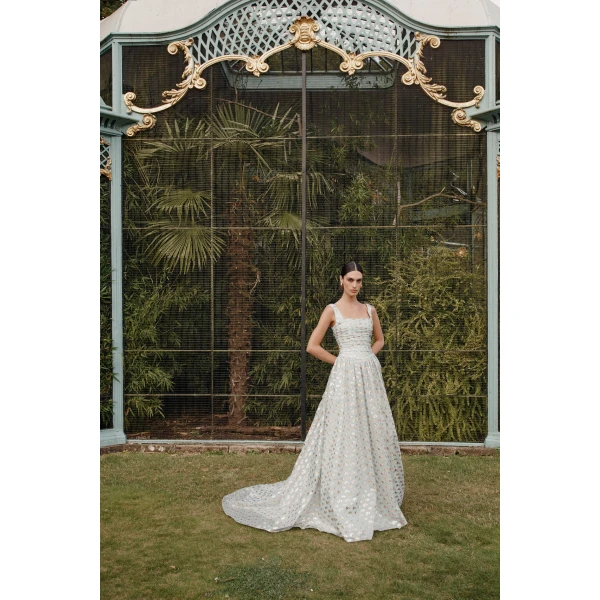 Markarian dress with romantic neckline and structured silhouette