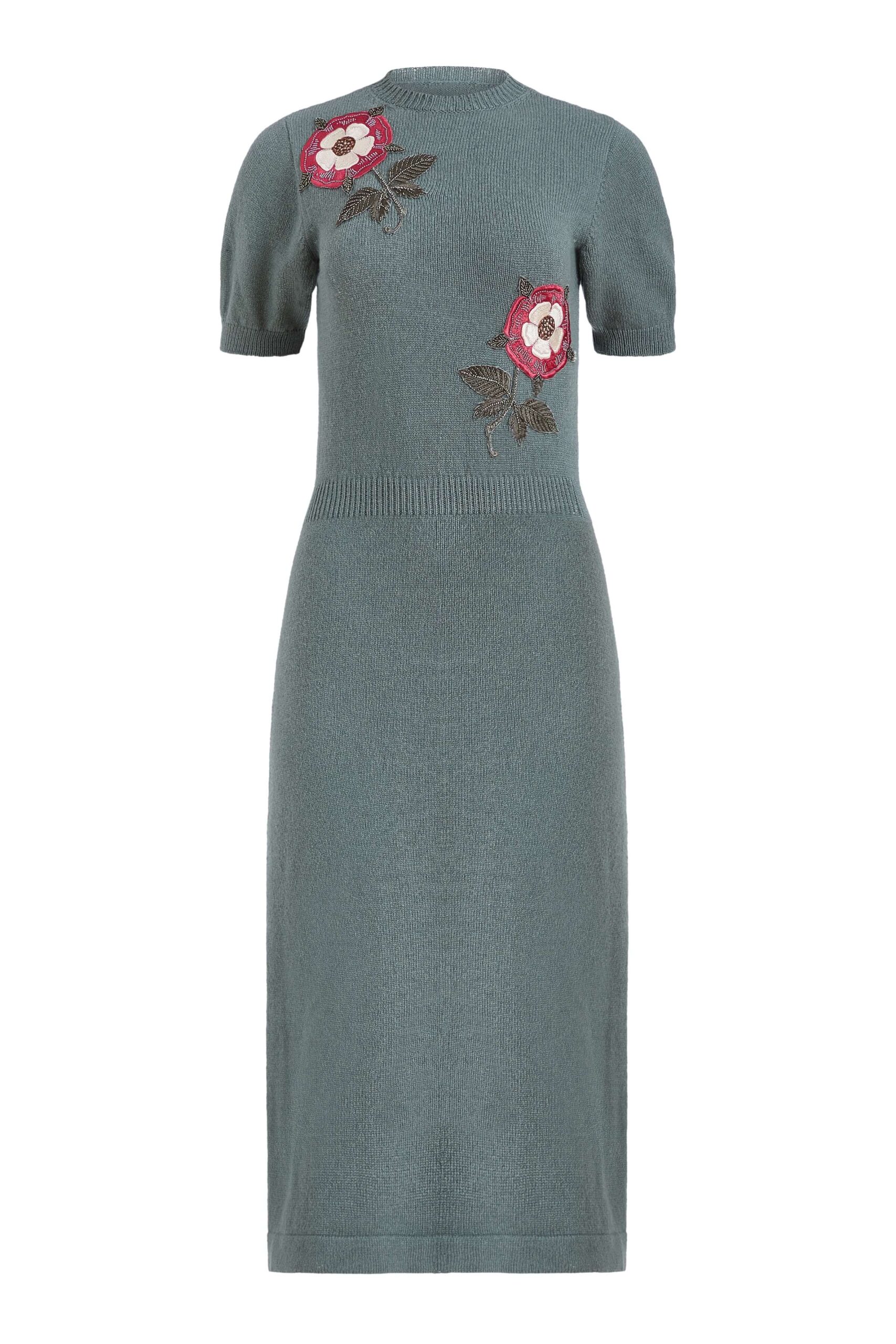 Markarian gown with romantic neckline and structured silhouette