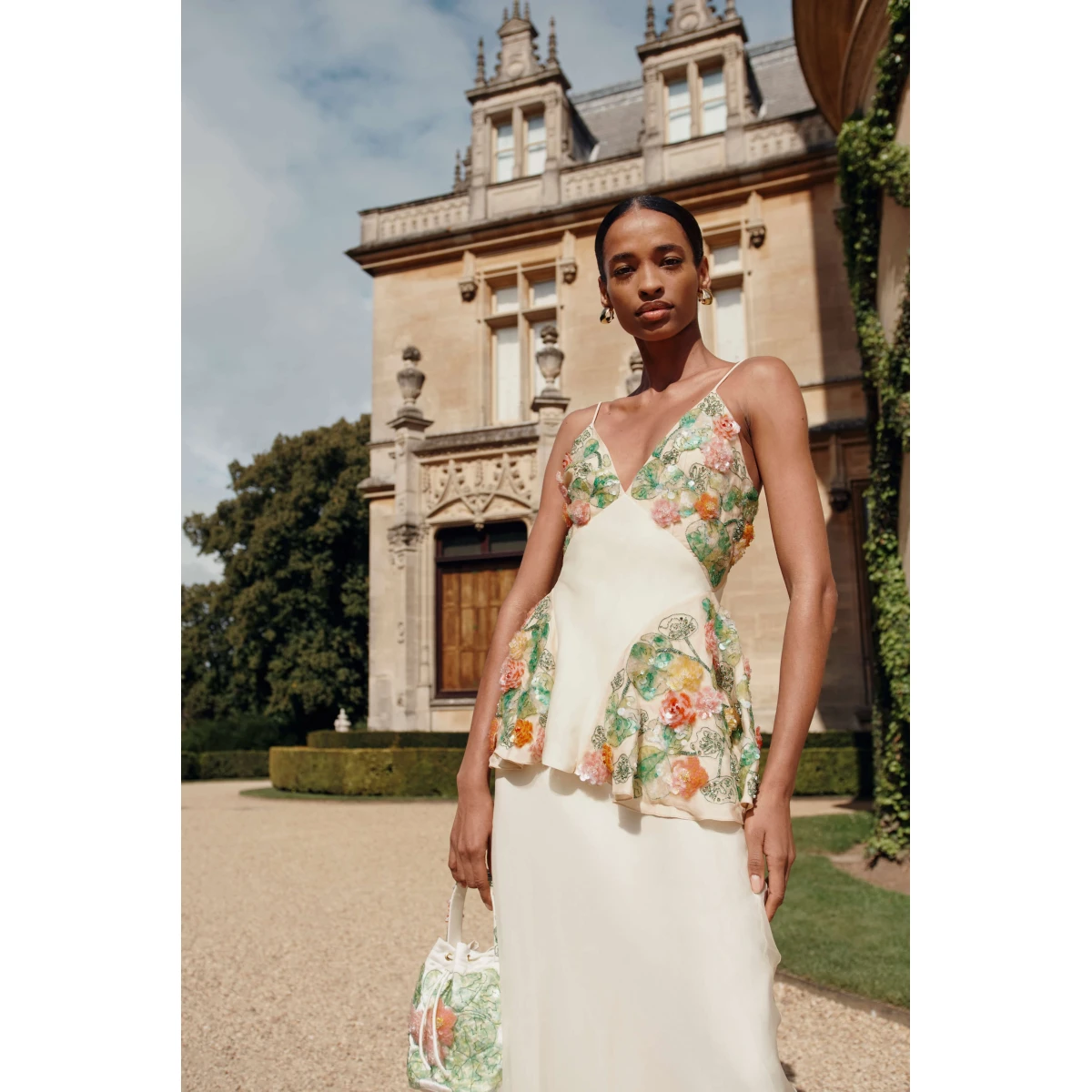 Markarian dress with romantic neckline and structured silhouette