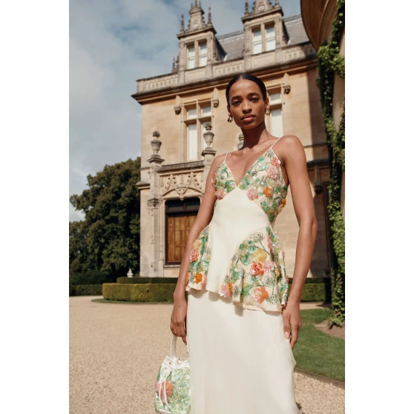 Markarian dress with romantic neckline and structured silhouette