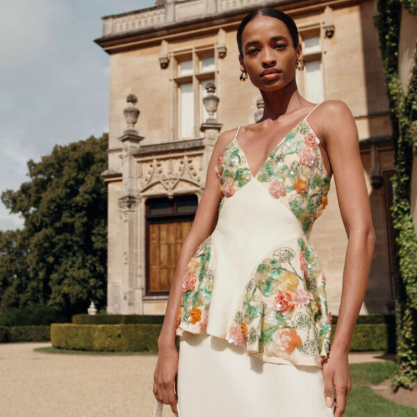 Markarian dress with romantic neckline and structured silhouette