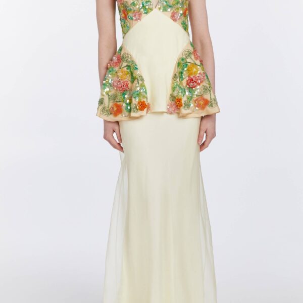 Markarian dresses with romantic neckline and structured silhouette