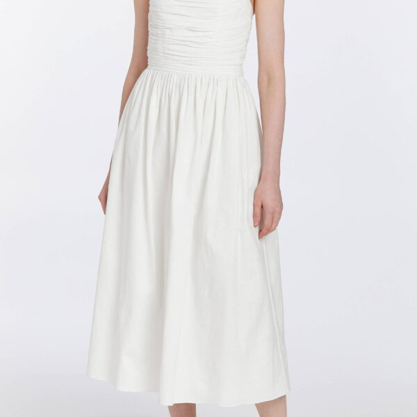 Markarian dresses with romantic neckline and structured silhouette