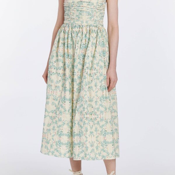 Markarian dresses with romantic neckline and structured silhouette
