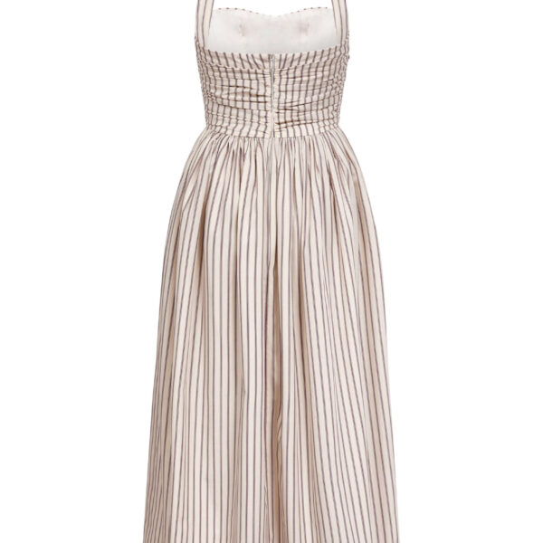 Markarian dresses with romantic neckline and structured silhouette