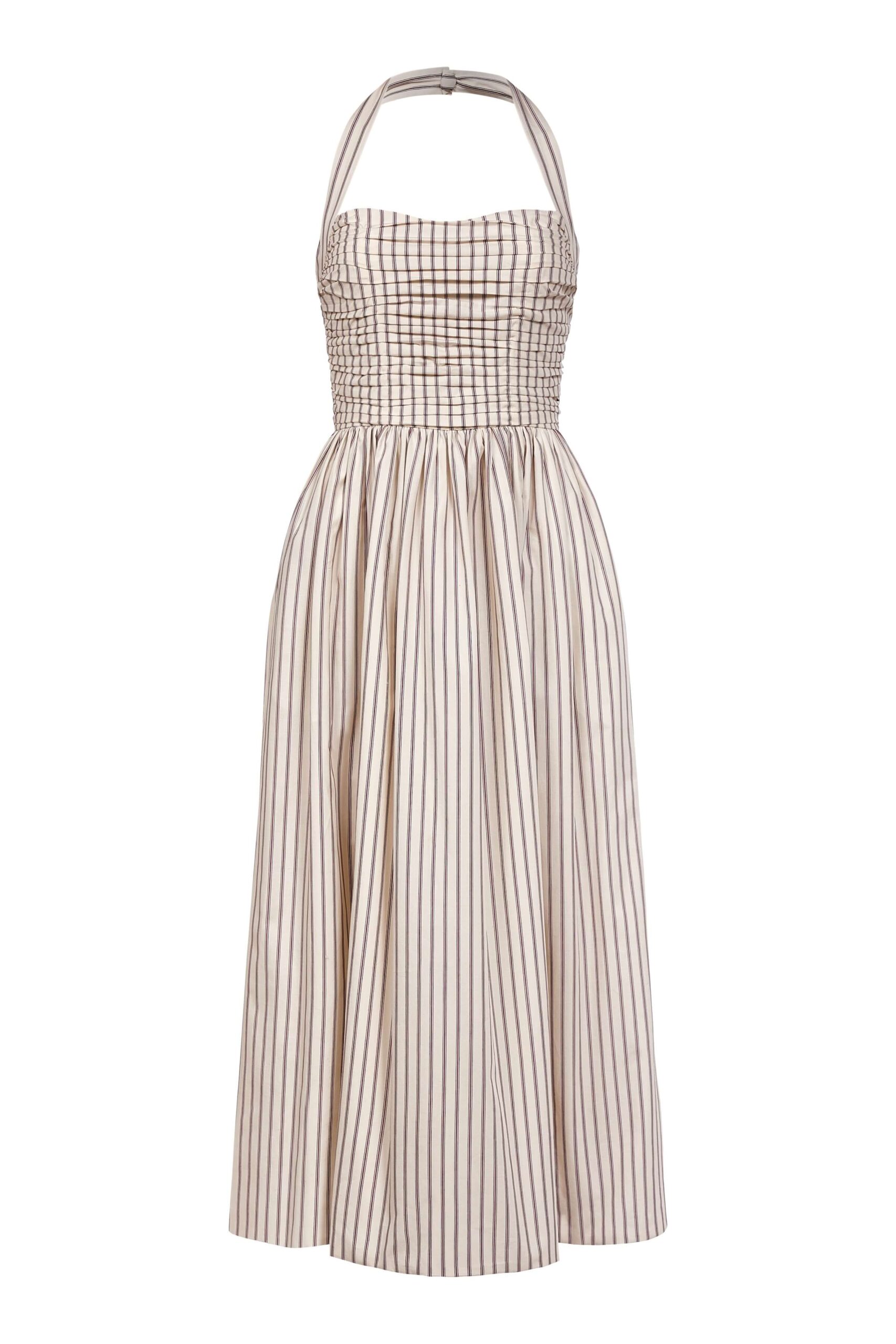 Markarian gown with romantic neckline and structured silhouette