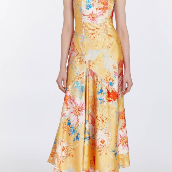 Markarian dresses with romantic neckline and structured silhouette