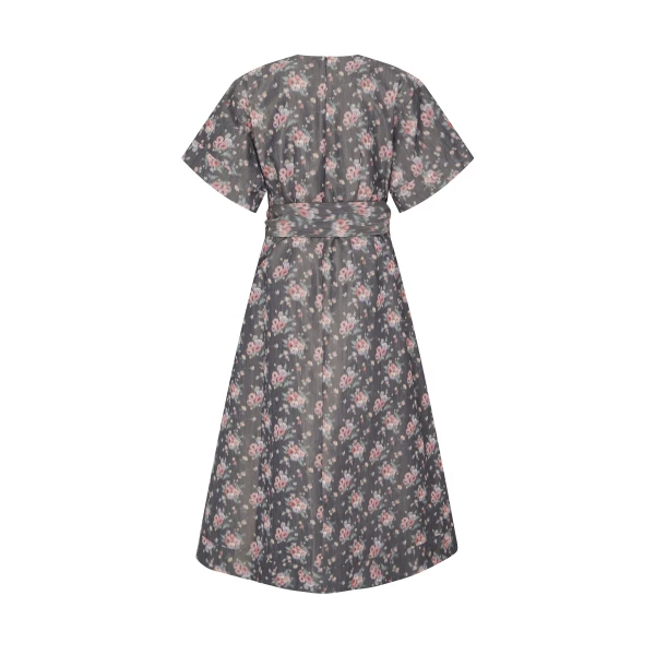 Markarian dresses with romantic neckline and structured silhouette