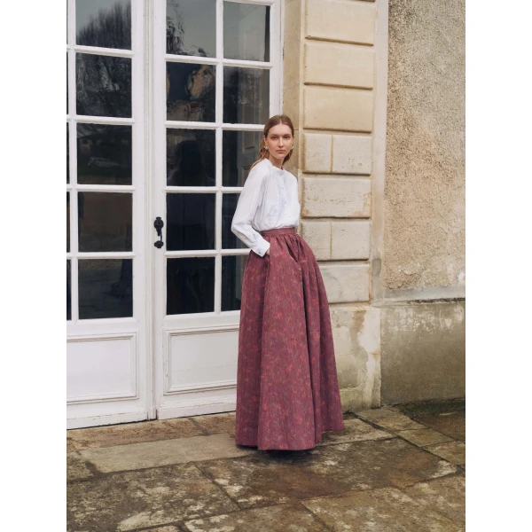 Markarian dress with romantic neckline and structured silhouette