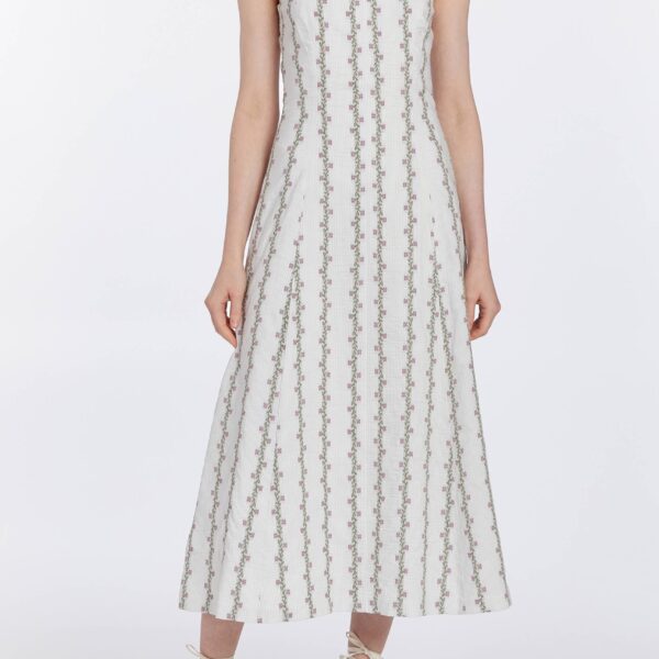 Markarian dresses with romantic neckline and structured silhouette