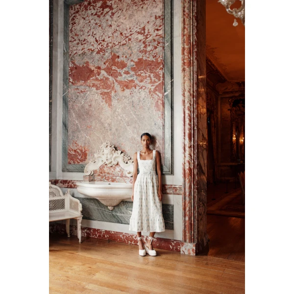 Markarian dress with romantic neckline and structured silhouette