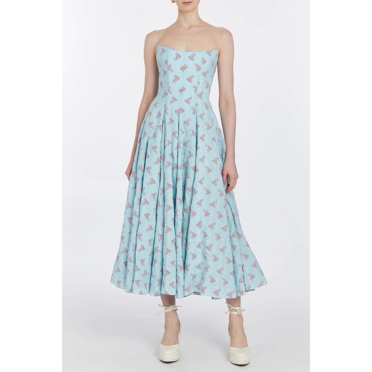 Markarian dresses with romantic neckline and structured silhouette