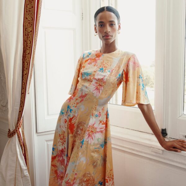 Markarian dress with romantic neckline and structured silhouette