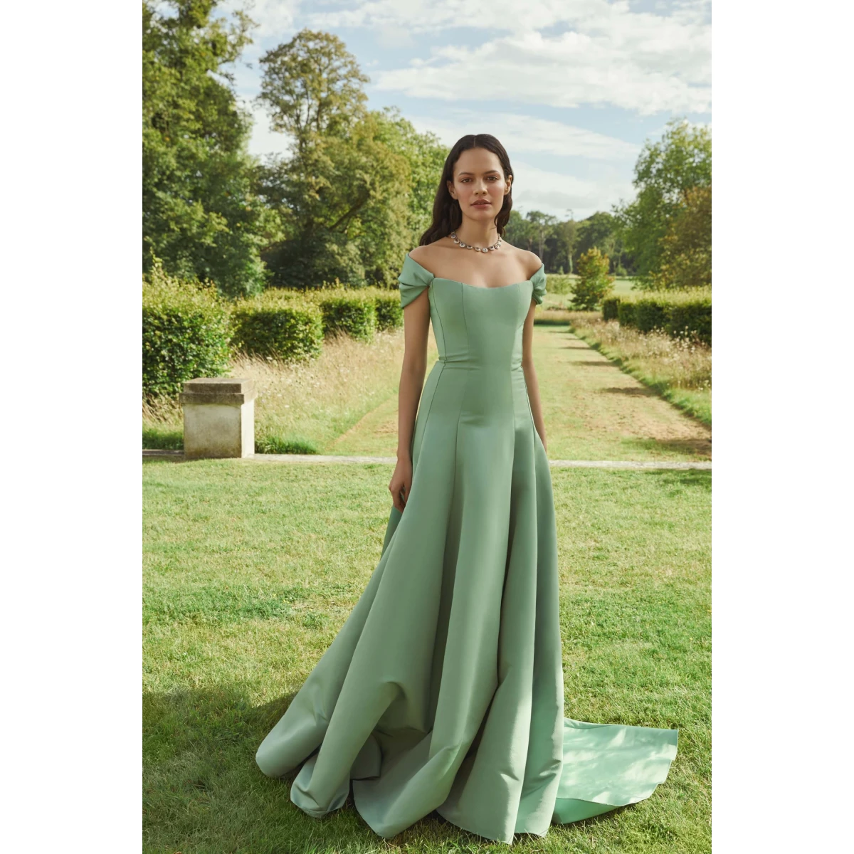 Markarian dress with romantic neckline and structured silhouette