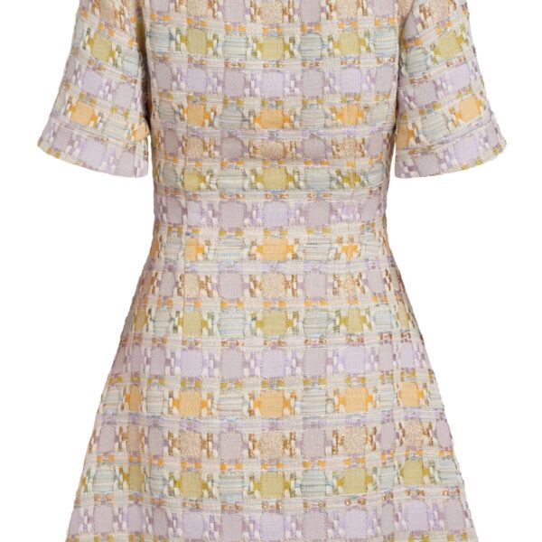 Markarian dresses with romantic neckline and structured silhouette