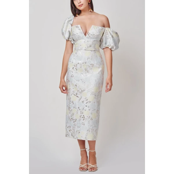 Markarian dresses with romantic neckline and structured silhouette