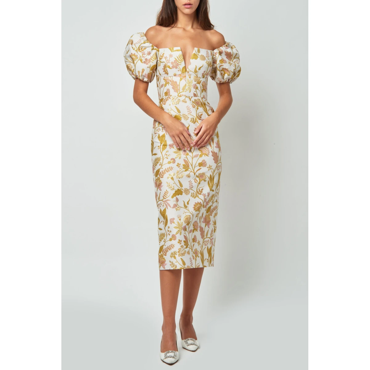 Markarian dresses with romantic neckline and structured silhouette