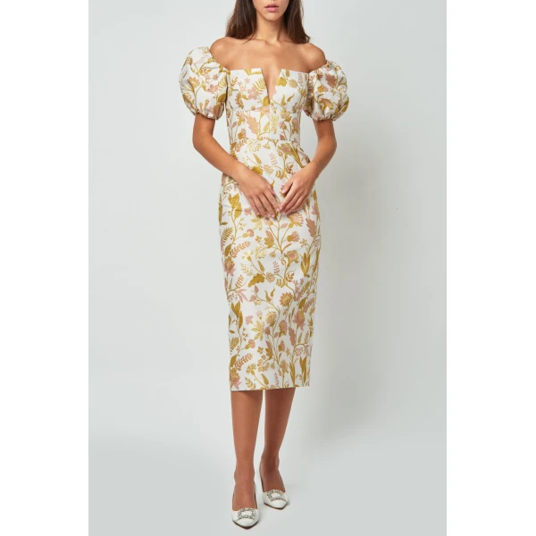 Markarian dresses with romantic neckline and structured silhouette
