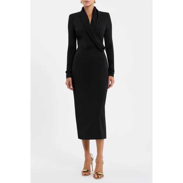 its graceful cowl neckline and softly wrapped bodice create a flattering shape