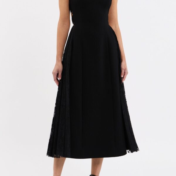 enhanced by princess seams to flatter the figure. Its circular midi skirt shapes a graceful silhouette
