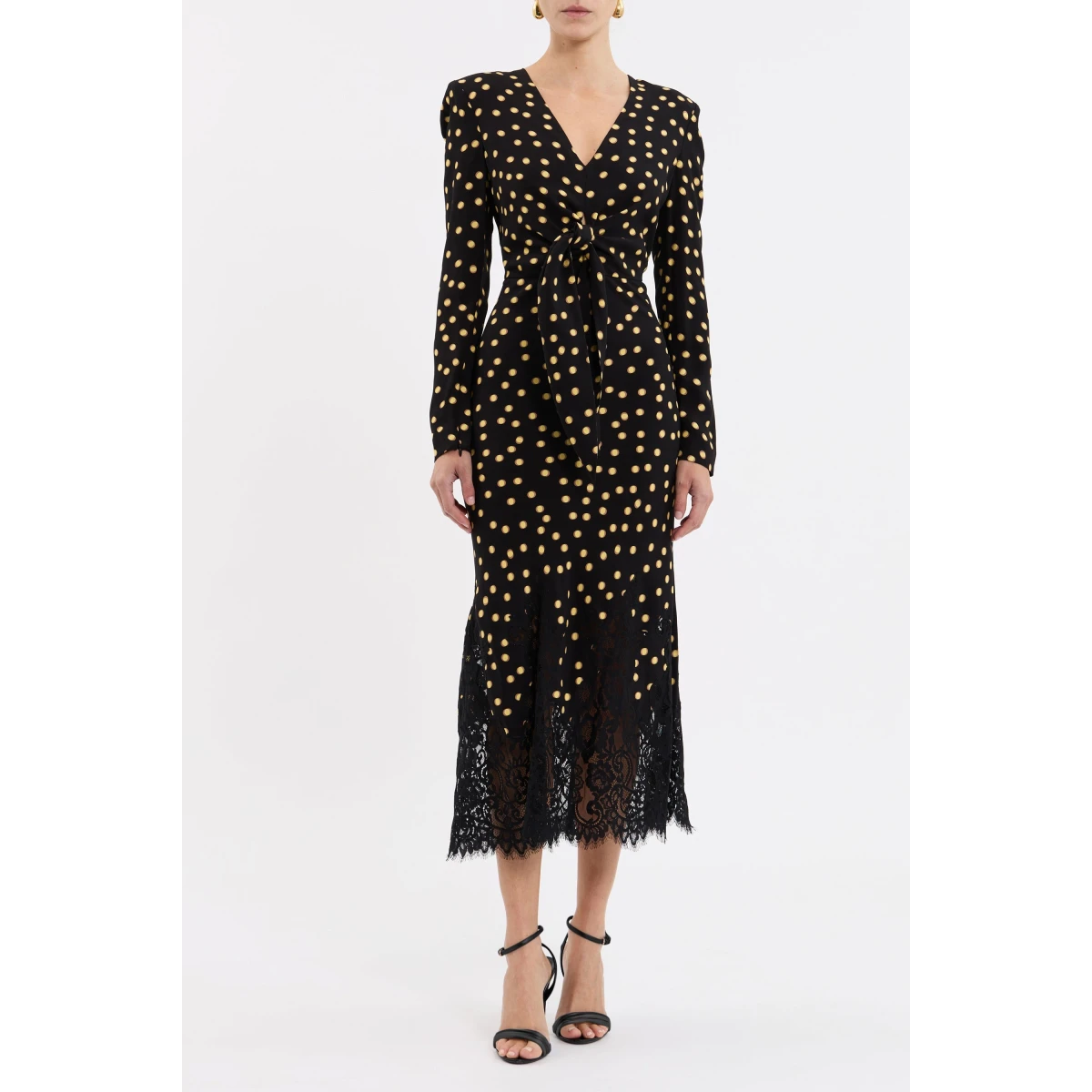 tailored from viscose crepe in a black and yellow polka dot print. Featuring a V neckline