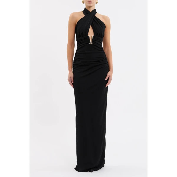tailored from premium jersey. The twisted halter neckline and gathered bodice feature a front cut out adorned with a gold V trim