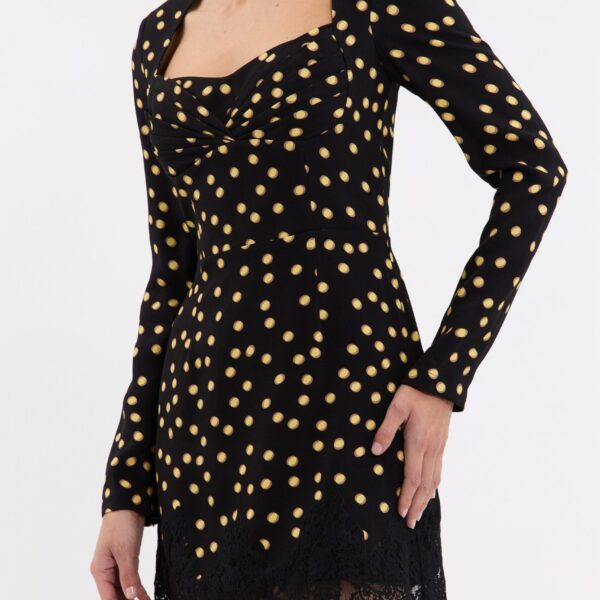 while an invisible zip fastening at the back ensures a seamless fit. Fully lined for comfort