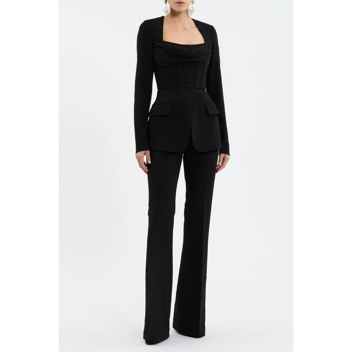 it features long sleeves and a scoop neckline that blend seamlessly into a corseted bodice